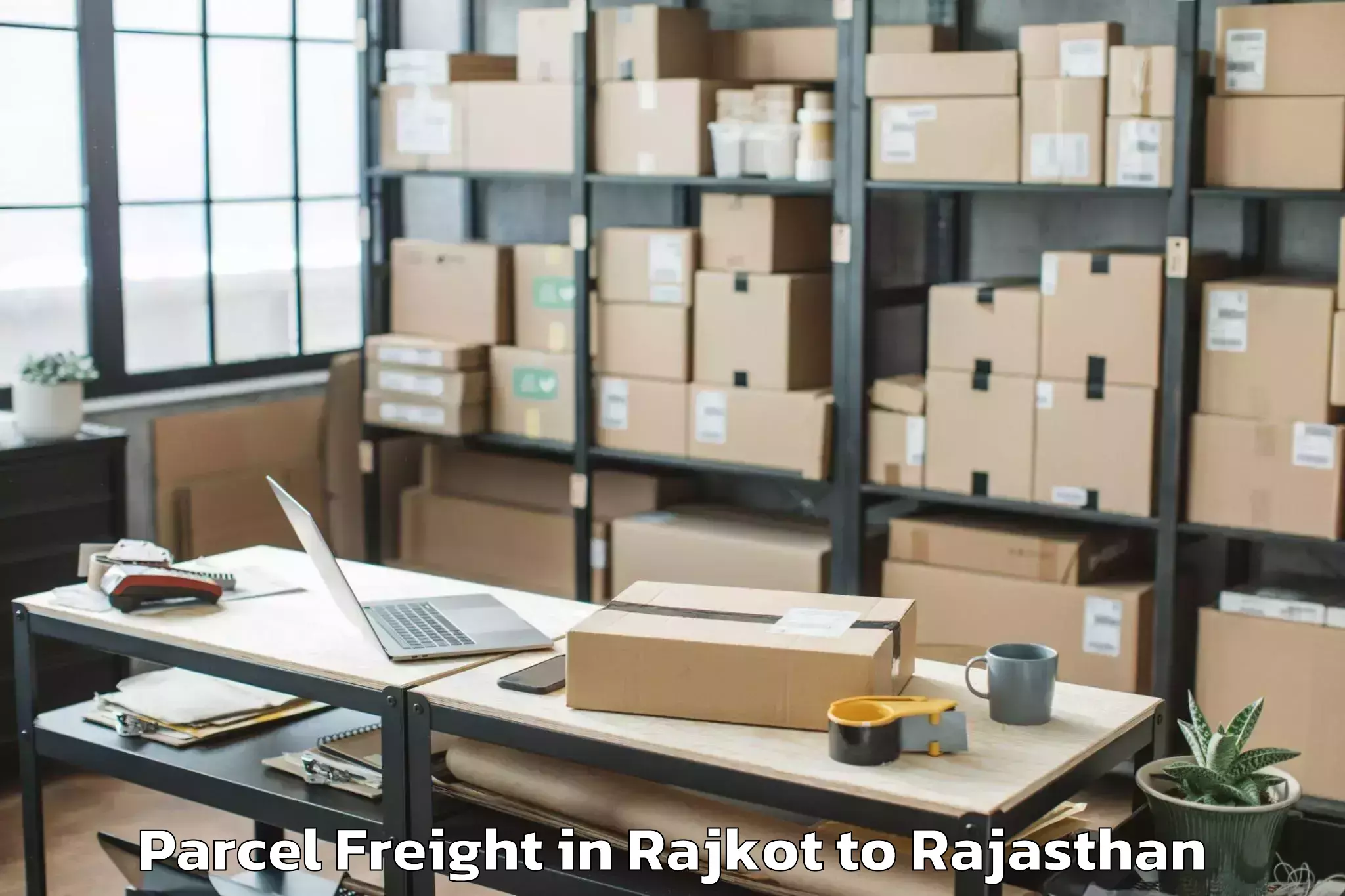 Book Rajkot to Sardar Patel University Of Pol Parcel Freight Online